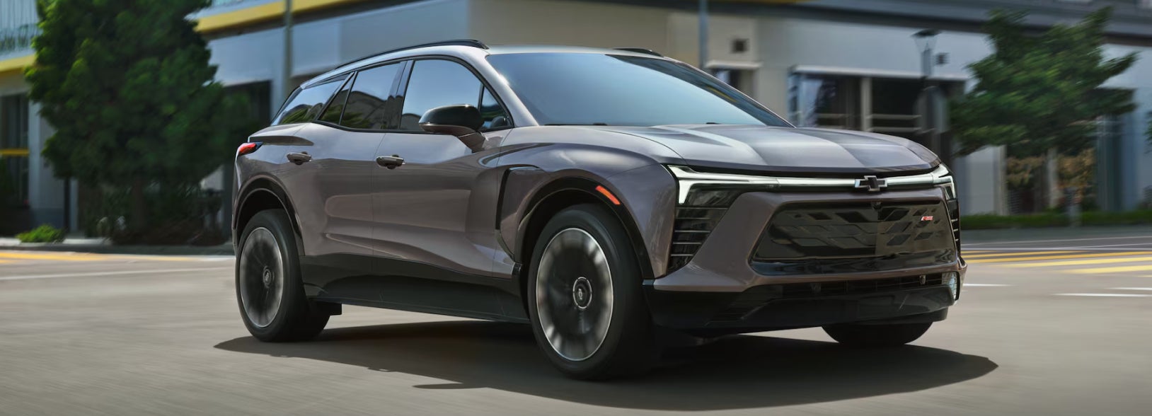 Chevrolet SUV driving through an intersection